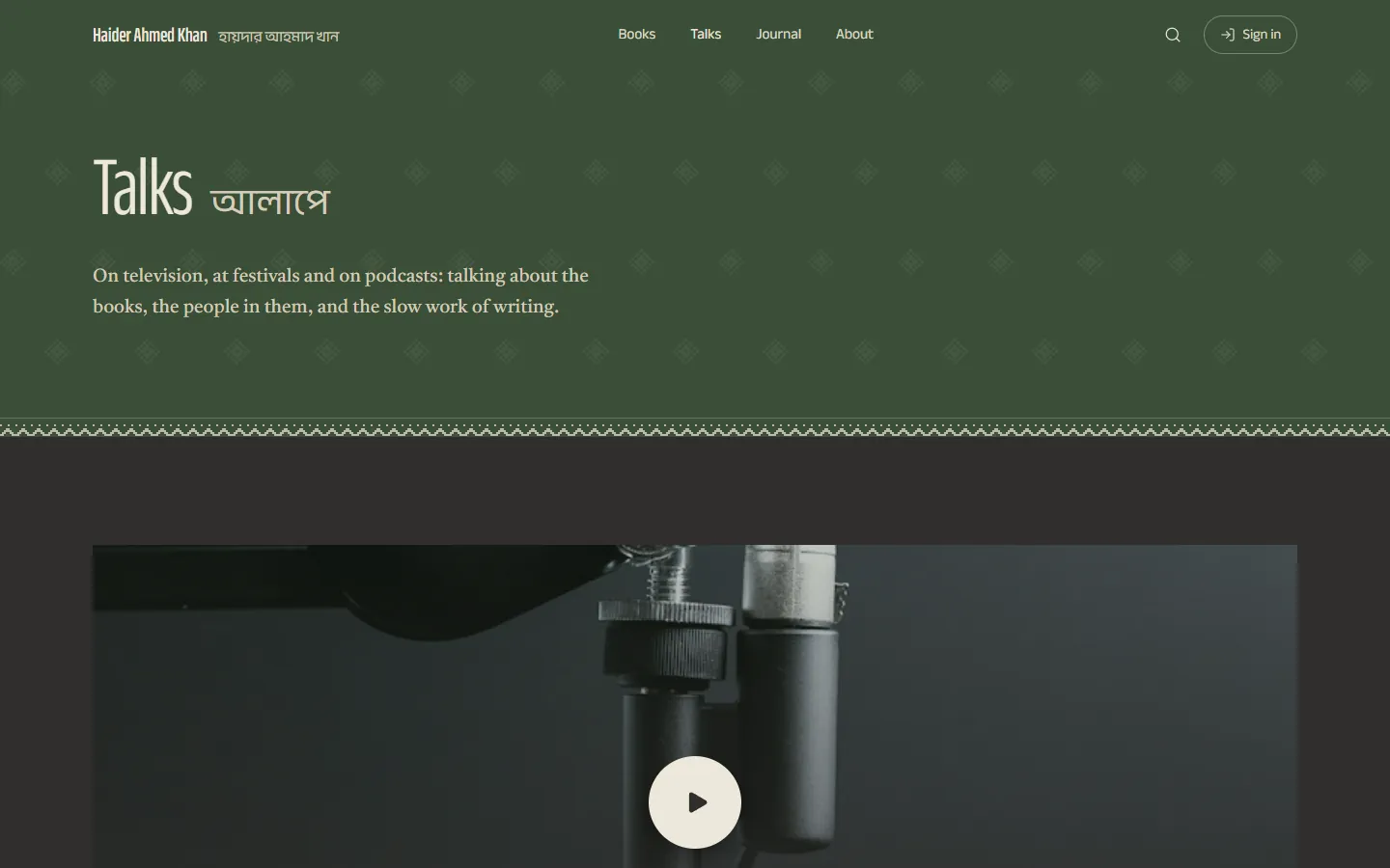 Talks page with a video player for an interview